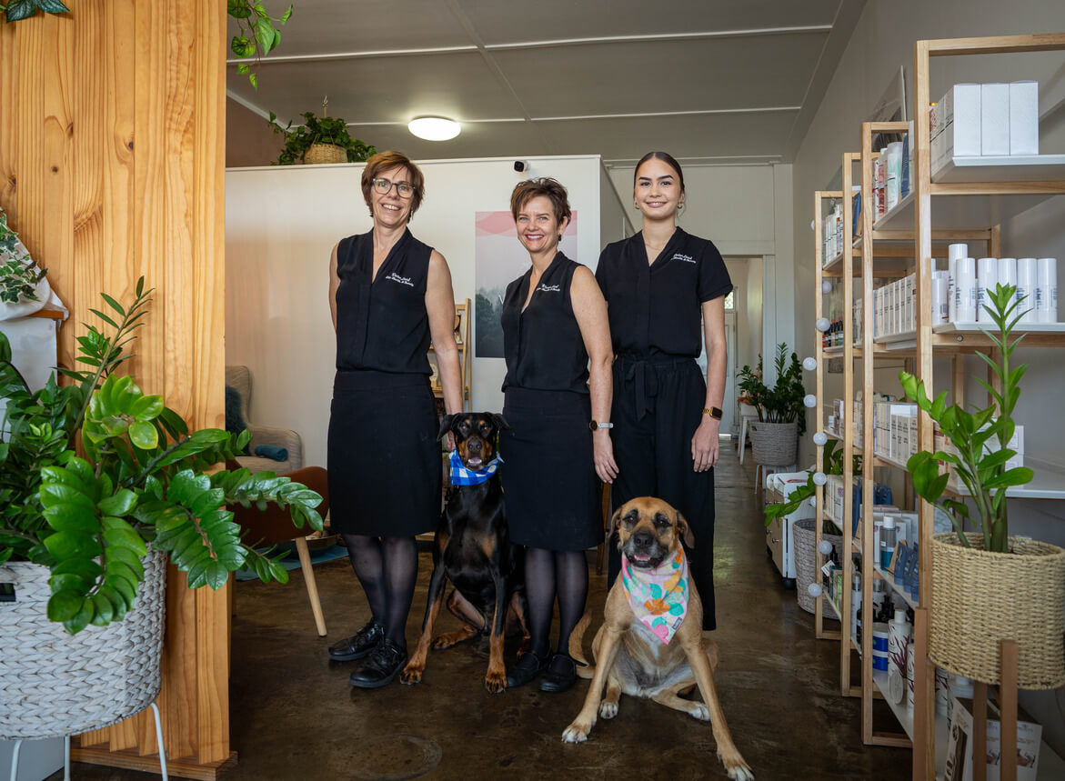 Danna, Katie, and Shantel with Hank & Bugs at WaterLeaf Skin Health & Beauty Townsville